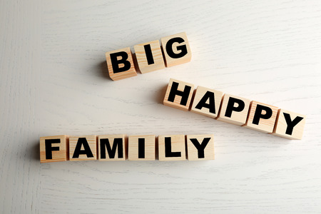 Words BIG HAPPY FAMILY on light backgroundの写真素材