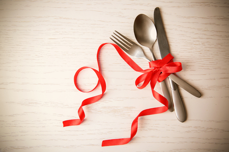 Beautiful table setting on white wooden tableの写真素材