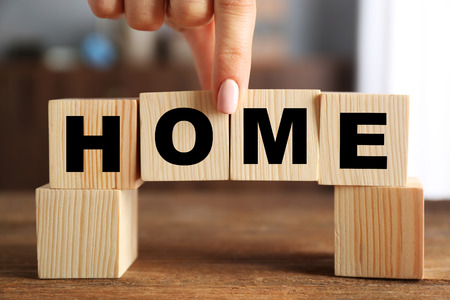 Word HOME on wooden backgroundの写真素材