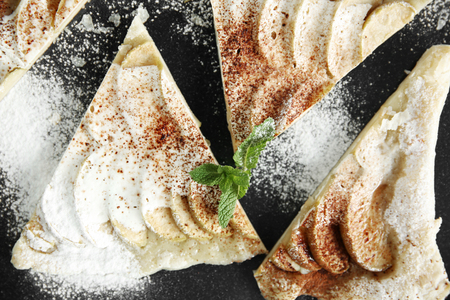 Sliced apple dessert on black backgroundの写真素材