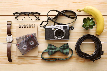 Top view of clothing and personal accessory on wooden backgroundの写真素材