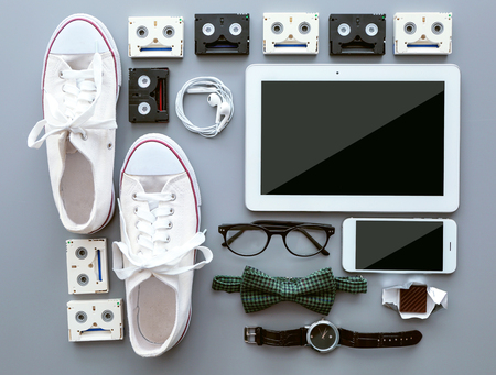 Top view of clothing and personal accessory on the grey backgroundの写真素材