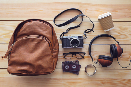 Top view of clothing and personal accessory on wooden backgroundの写真素材