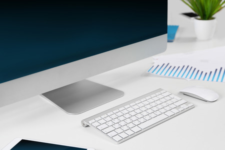 Computer on white table