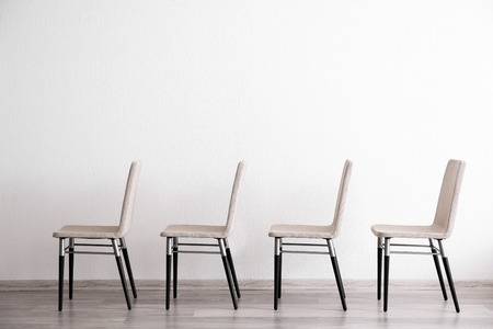 Set of chairs in light room interiorの写真素材