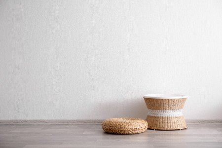 Wicker stool in light room interiorの写真素材