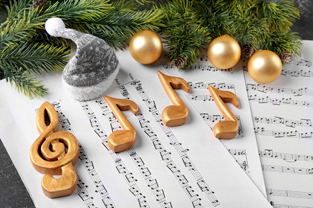 Christmas decorations on music sheetsの写真素材