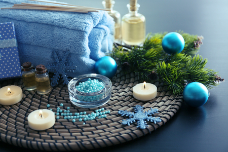 Spa treatment with Christmas decorations on wooden backgroundの写真素材