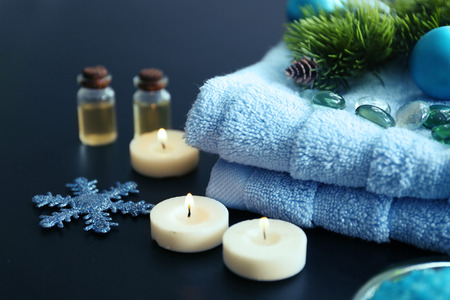Spa treatment with Christmas decorations on wooden backgroundの写真素材