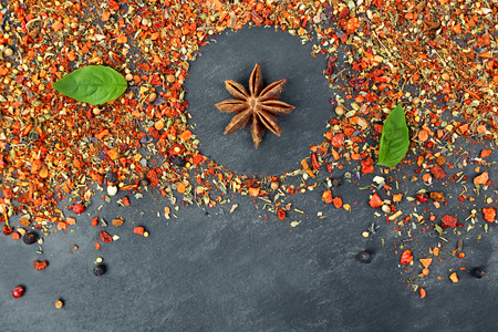 Mixed spices with round silhouette on gray backgroundの写真素材