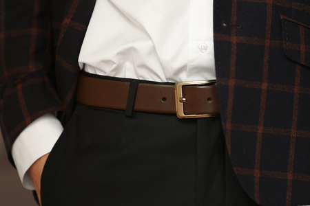 Stylish man holding hand in pocket