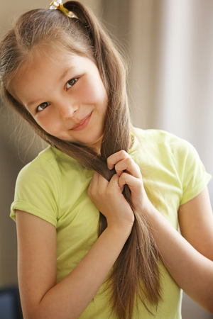 Portrait of happy little girlの写真素材