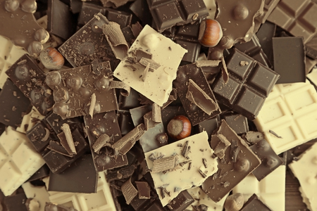 Chopped chocolate bars with nutsの写真素材