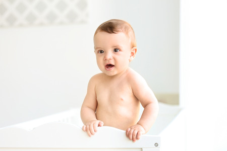 Cute baby in the bed