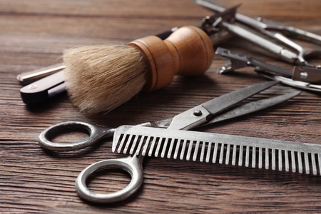 Vintage tools of barber shop on wooden backgroundの写真素材