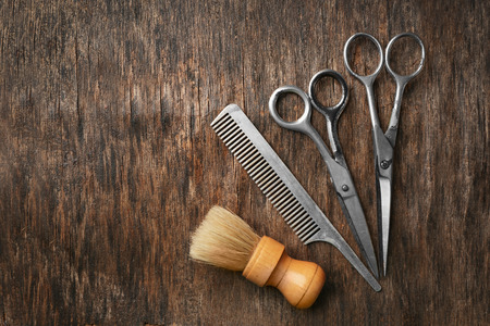 Vintage tools of barber shop on wooden backgroundの写真素材