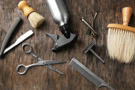 Vintage tools of barber shop on wooden backgroundの写真素材