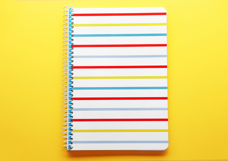 School notebook on color backgroundの写真素材