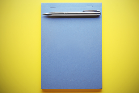 School notebook on color backgroundの写真素材