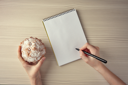 Woman counting calories, top viewの写真素材