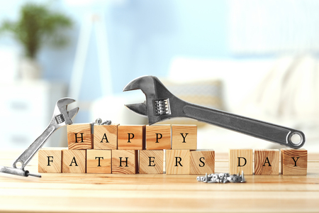 Wooden cubes on light background. Happy fathers day conceptの写真素材