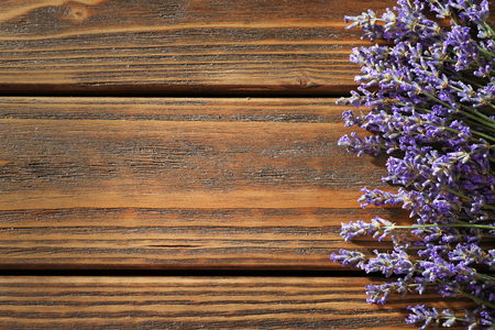 Bunch of lavender on wooden tableの写真素材
