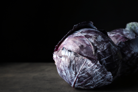 Fresh red cabbage on black backgroundの写真素材