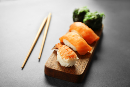 Delicious sushi set on wooden boardの写真素材