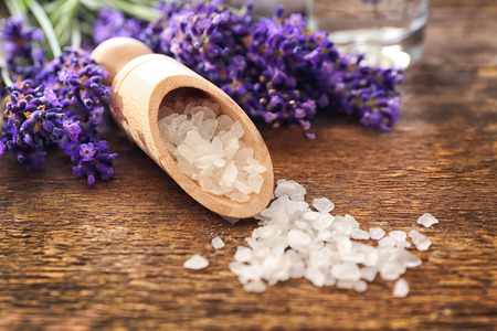 Sea salt with lavender on wooden backgroundの写真素材
