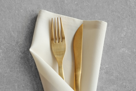 Table setting with fork, knife and napkin, closeupの写真素材