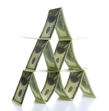 Money pyramid, isolated on whiteの写真素材