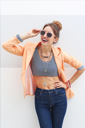 Beautiful girl on light backgroundの写真素材