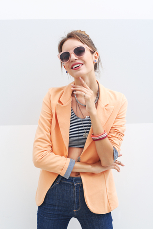 Beautiful girl on light backgroundの写真素材
