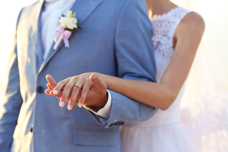 Groom and bride hands, closeupの写真素材