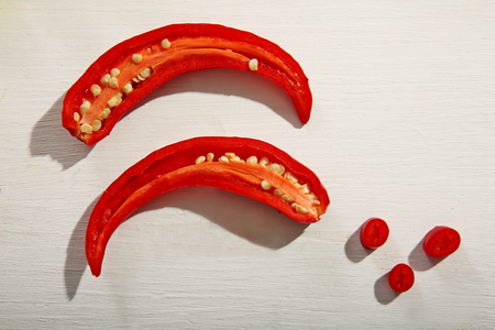 Sliced red pepper on tableの写真素材