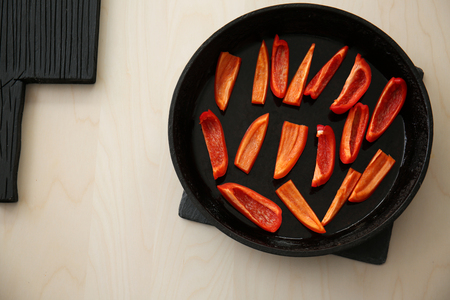 Pepper pieces in panの写真素材