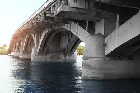 Concrete bridge over riverの写真素材