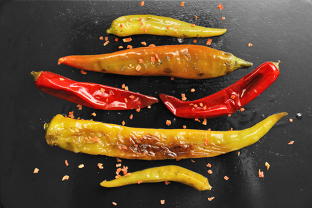 Snack of pepper with spices on pan, closeupの写真素材