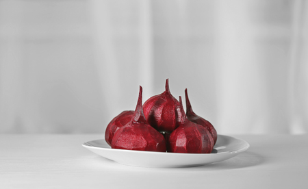 Tasty peeled beets on white plateの写真素材