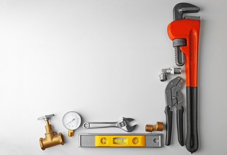 Plumber tools frame isolated on whiteの写真素材