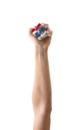 Valves  in man's hand  isolated on whiteの写真素材