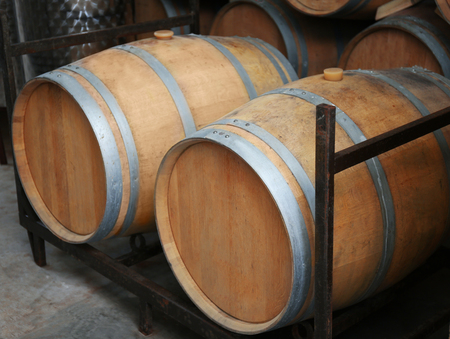 Wooden barrels for wine in cellar