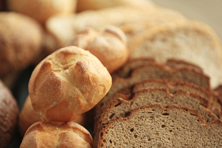 Lots of fresh bread and slices closeupの写真素材