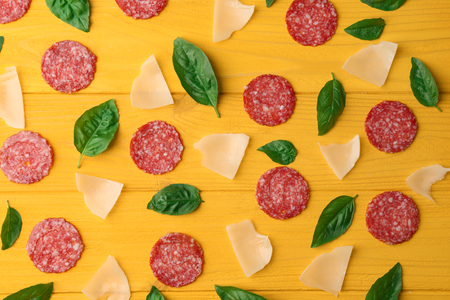 Pizza ingredients  on wooden backgroundの写真素材