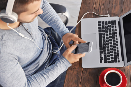 Man having coffee break at workplace