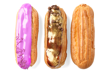 Delicious eclairs isolated on white