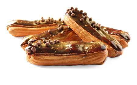 Delicious eclairs isolated on white