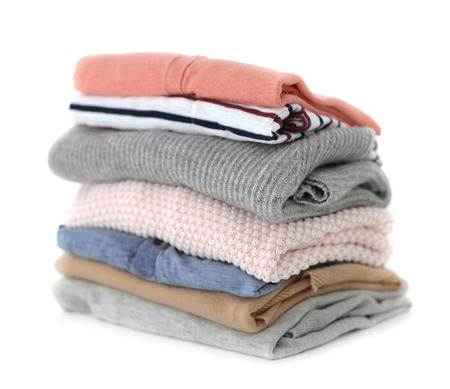 Pile of clothes on tableの写真素材