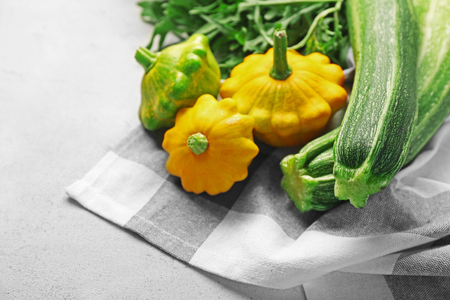 Fresh assorted squash on napkinの写真素材