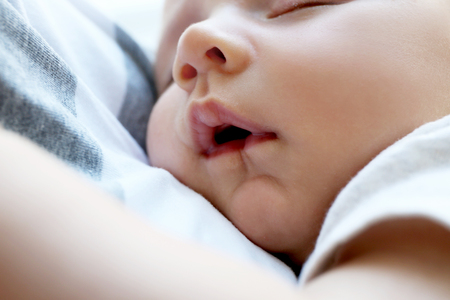 Portrait of cute sleeping baby, close up view